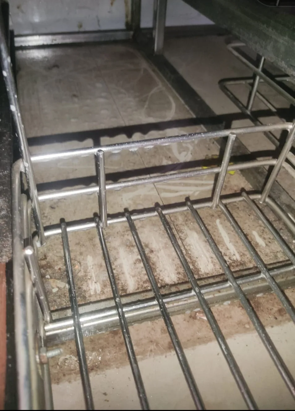 Before deep cleaning: greasy, dust-caked kitchen basket during a duplex home deep cleaning in mumbai in Mumbai
